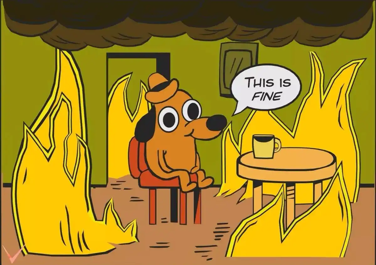 this is fine meme, dog drinking coffee surrounded by fire in burning house.